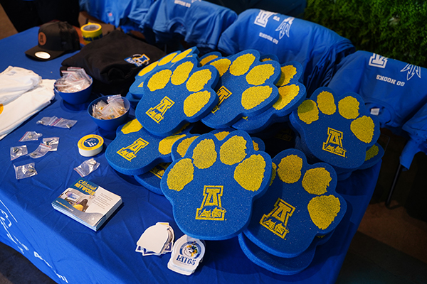 A variety of blue and gold gear was ready for the 香港六合彩开奖直播 alumni and supporters who gathered in Arizona in February 2024 to see the Alaska Nanooks take on the Arizona State University Sun Devils. Photo by Shayna Goldberg.